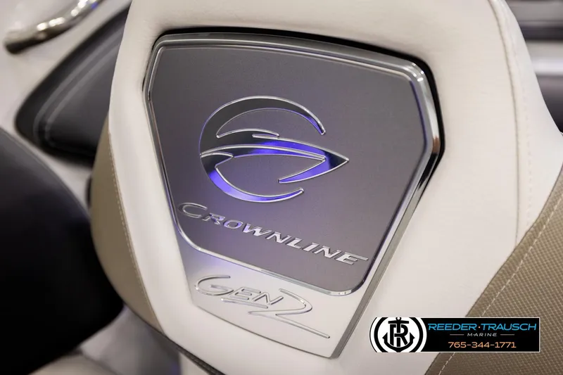 Slide: The Image of 2022 Crownline 265 SS boat interior with Gen 2 logo and Reeder-Trausch Marine branding. - 63