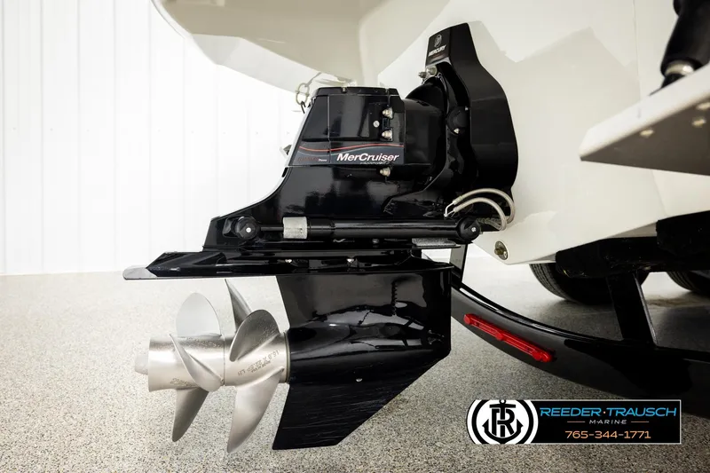 Slide: The Image of 2022 Crownline 265 SS boat with MerCruiser engine and propeller, showcased by Reeder Trausch Marine. - 70