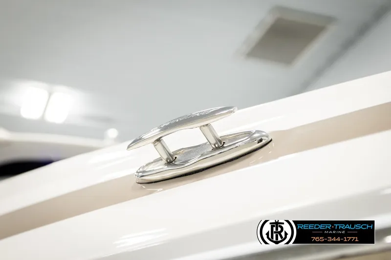 Slide: The Image of 2022 Crownline 265 SS boat cleat detail, Reeder-Trausch Marine branding visible. - 78
