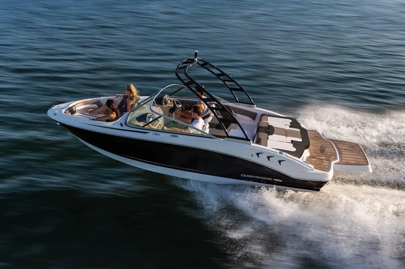 Slide: The Image of Manufacturer Provided Image: 2021 Chaparral 21 SSi speedboat cruising on open water. - 8