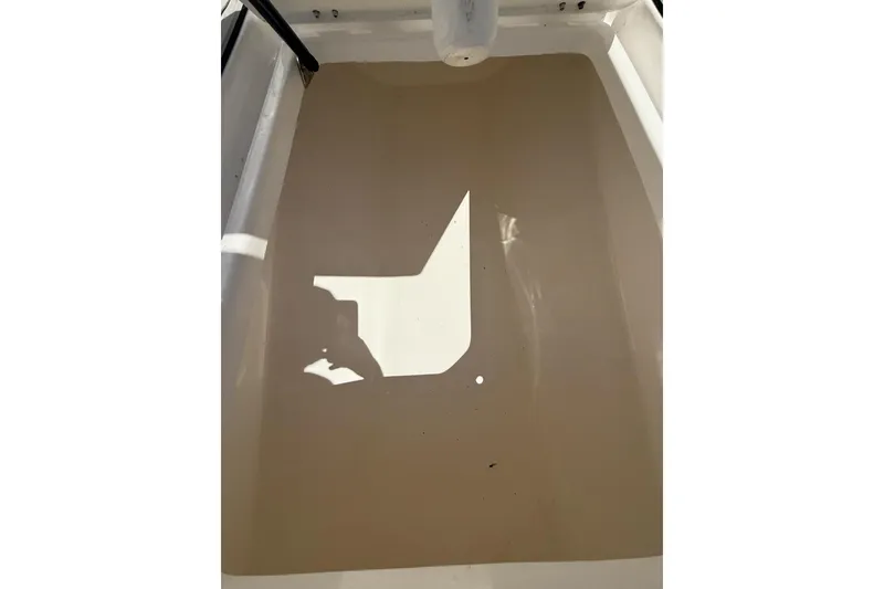 Slide: The Image of 2021 Custom Infusion 34 CC boat interior with water pooling on the deck. - 37