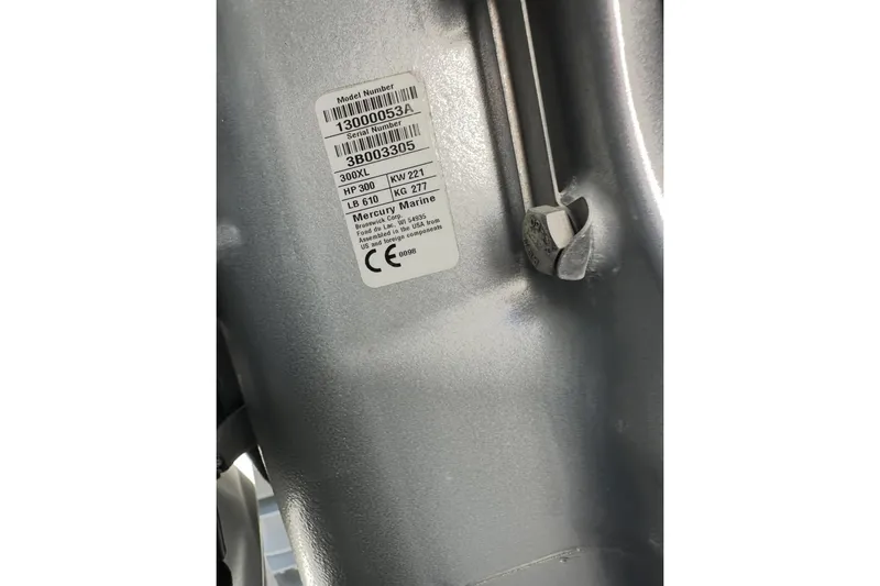 Slide: The Image of Label on a 2021 Custom Infusion 34 CC boat engine, showing model and serial numbers. - 65