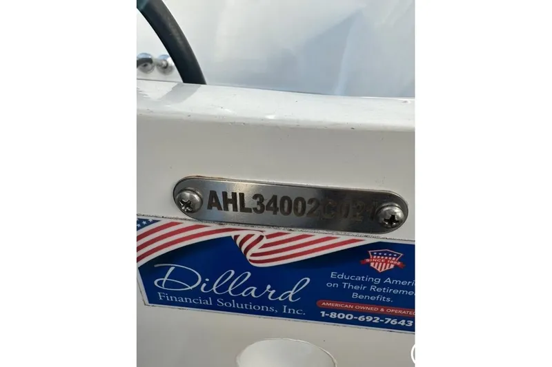 Slide: The Image of 2021 Custom Infusion 34 CC boat with identification plate and Dillard Financial Solutions sticker. - 67