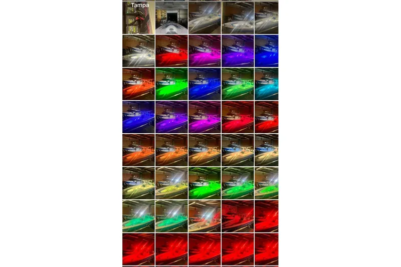 Slide: The Image of Custom Infusion 34 CC 2021 boat with vibrant LED lighting in various colors. - 90