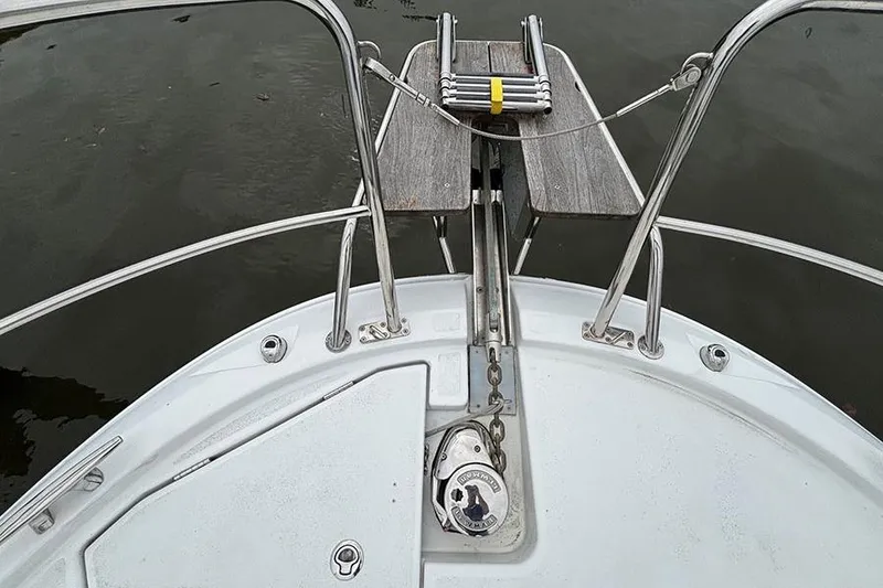 Slide: The Image of 2022 Jeanneau NC Weekender 1095 Fly docked with twin outboard engines. - 3