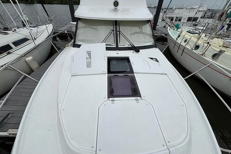 Slide: The Image of 2022 Jeanneau NC Weekender 1095 Fly docked with Yamaha engines. - 5