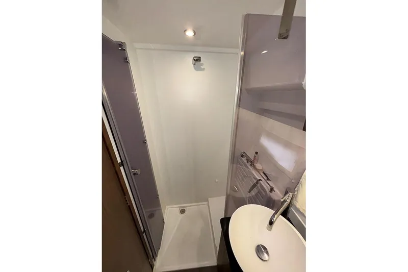 Slide: The Image of Bathroom interior of 2022 Jeanneau NC Weekender 1095 Fly yacht. - 51