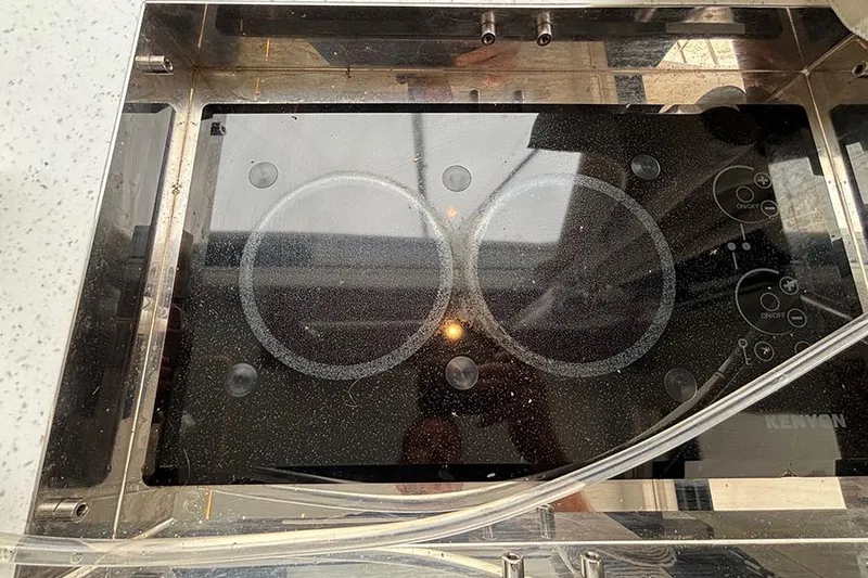 Slide: The Image of Glass cooktop on Jeanneau NC Weekender 1095 Fly, 2022 model. - 60