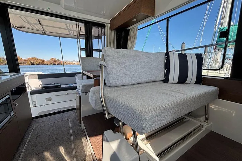 Slide: The Image of Interior of 2022 Jeanneau NC Weekender 1095 Fly with seating and scenic view. - 65