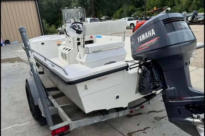 Slide: The Image of 2000 Pathfinder 1806 V boat with Yamaha V115 outboard motor on trailer. - 8