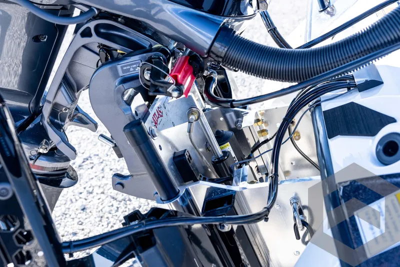 Slide: The Image of Close-up of 2026 Skeeter ZXE20 boat engine components and wiring. - 24