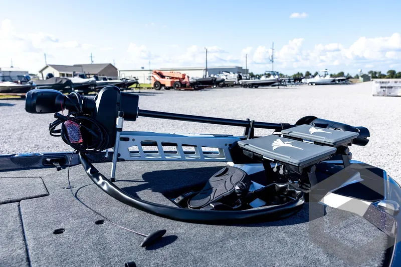 Slide: The Image of 2026 Skeeter ZXE20 boat deck with advanced fishing equipment and controls. - 33