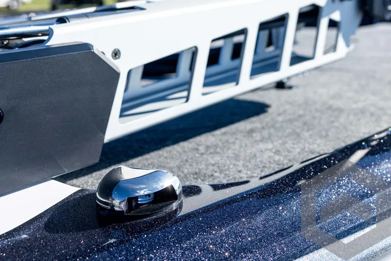 Slide: The Image of Close-up of 2026 Skeeter ZXE20 boat deck with metallic finish and hardware. - 38