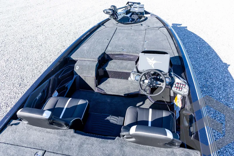 Slide: The Image of 2026 Skeeter ZXE20 boat interior with dual seats and modern dashboard. - 40