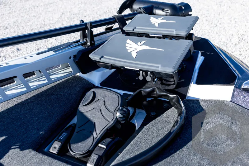 Slide: The Image of 2026 Skeeter ZXE20 boat deck with advanced control panels and foot pedal. - 43