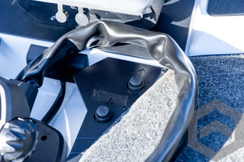 Slide: The Image of Close-up of 2026 Skeeter ZXE20 boat controls with textured flooring. - 45