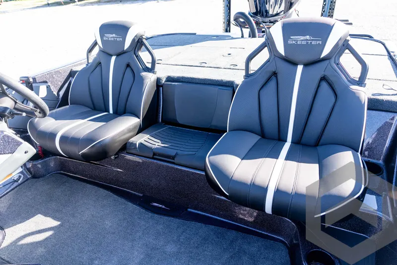 Slide: The Image of 2026 Skeeter ZXE20 boat interior with sleek black and white seating design. - 55