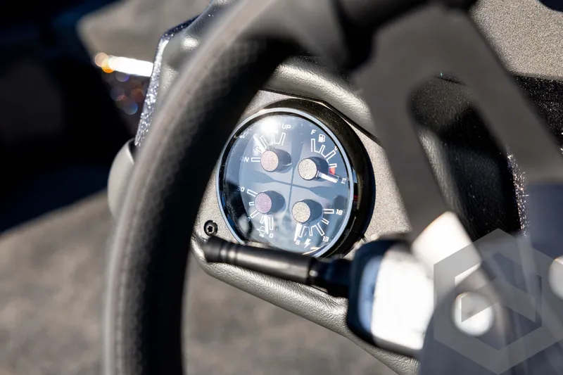 Slide: The Image of Close-up of 2026 Skeeter ZXE20 dashboard gauges in a sleek, modern design. - 61