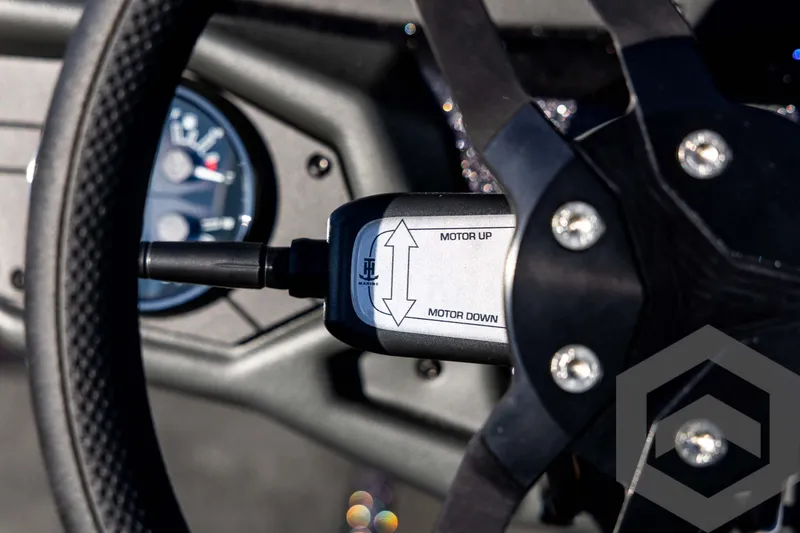 Slide: The Image of Steering wheel and motor control of 2026 Skeeter ZXE20 boat. - 62