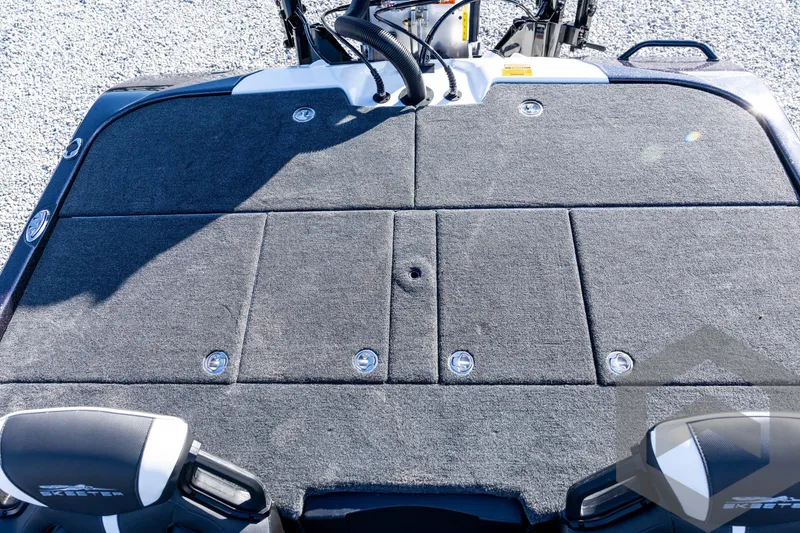 Slide: The Image of 2026 Skeeter ZXE20 boat deck with storage compartments and sleek design. - 67