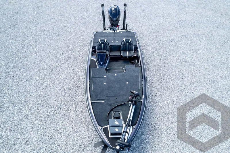Slide: The Image of 2026 Skeeter ZXE20 fishing boat on gravel surface, top view. - 83