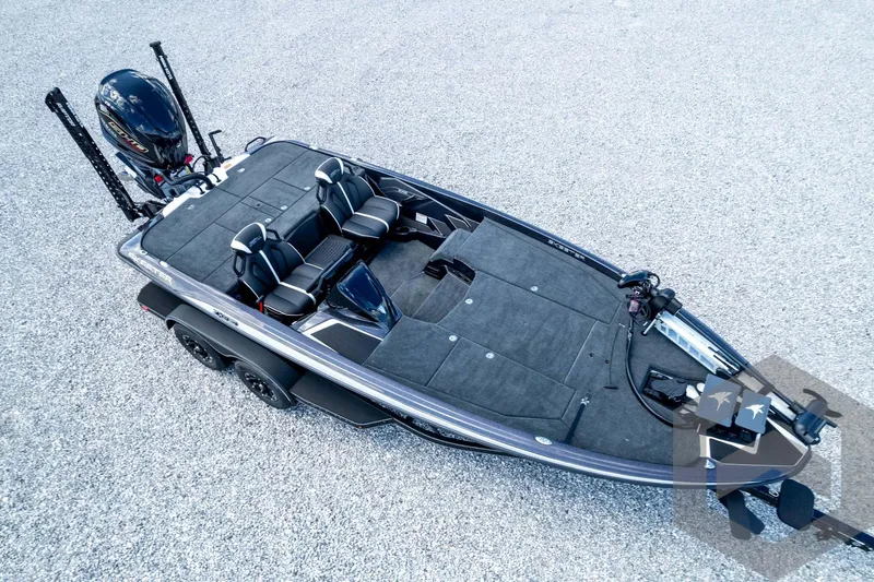 Slide: The Image of 2026 Skeeter ZXE20 fishing boat with dual seats and advanced equipment on gravel surface. - 84