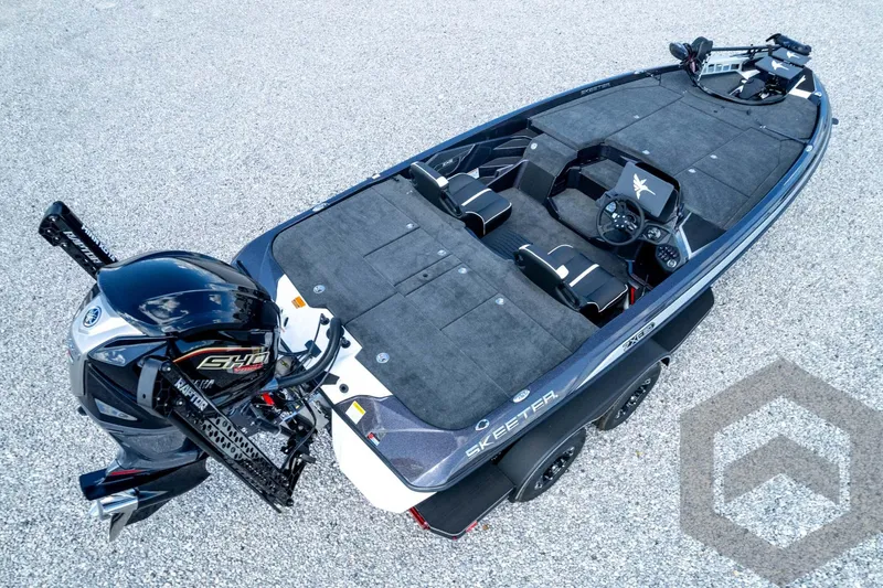 Slide: The Image of 2026 Skeeter ZXE20 fishing boat with Yamaha engine, top view on gravel surface. - 86