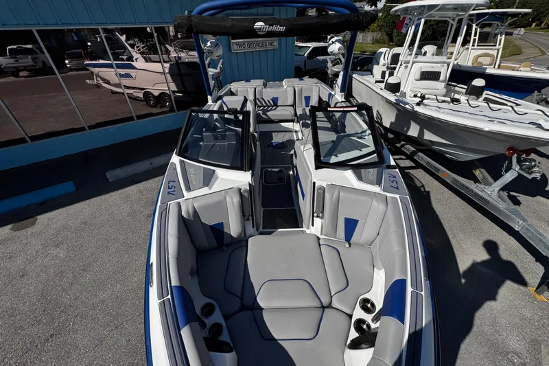 Slide: The Image of 2022 Malibu Wakesetter 23 LSV boat with sleek interior design and seating. - 15