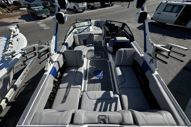 Slide: The Image of 2022 Malibu Wakesetter 23 LSV boat interior with spacious seating and modern design. - 17
