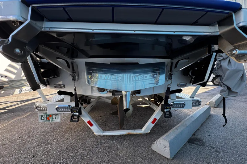 Slide: The Image of Rear view of 2022 Malibu Wakesetter 23 LSV boat on trailer. - 29