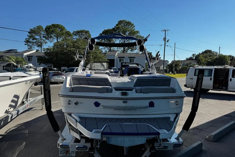 Slide: The Image of 2022 Malibu Wakesetter 23 LSV boat in parking lot, rear view. - 3