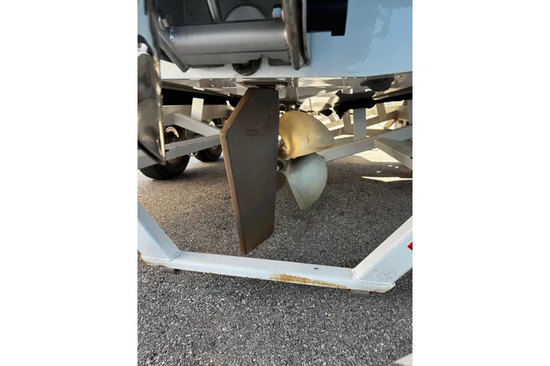 Slide: The Image of 2022 Malibu Wakesetter 23 LSV boat propeller and rudder detail. - 30