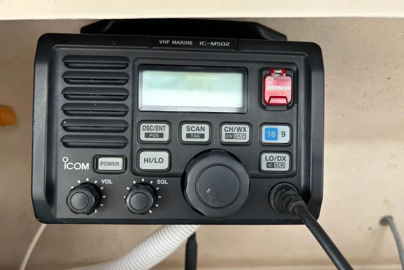 Slide: The Image of VHF marine radio on 2004 Grady-White Express 330 boat dashboard. - 6