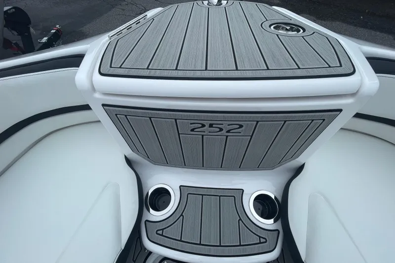 Slide: The Image of 2026 Yamaha Boats 252S interior with sleek gray and white design. - 11