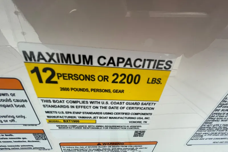 Slide: The Image of Yamaha Boats 252S 2026 capacity label: 12 persons or 2200 lbs, safety compliance. - 14