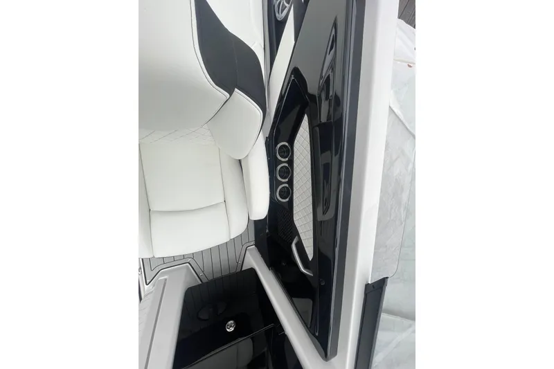 Slide: The Image of 2026 Yamaha Boats 252S interior with sleek black and white seating design. - 19