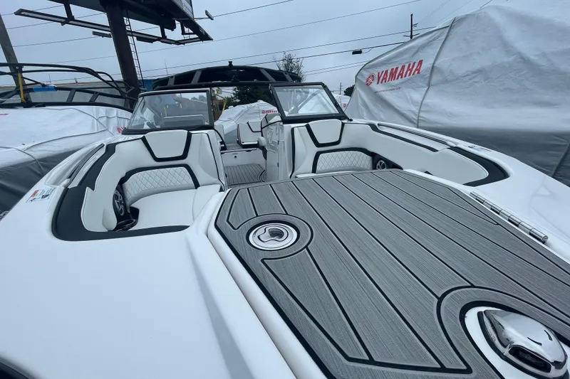 Slide: The Image of 2026 Yamaha Boats 252S interior with sleek seating and modern design. - 2