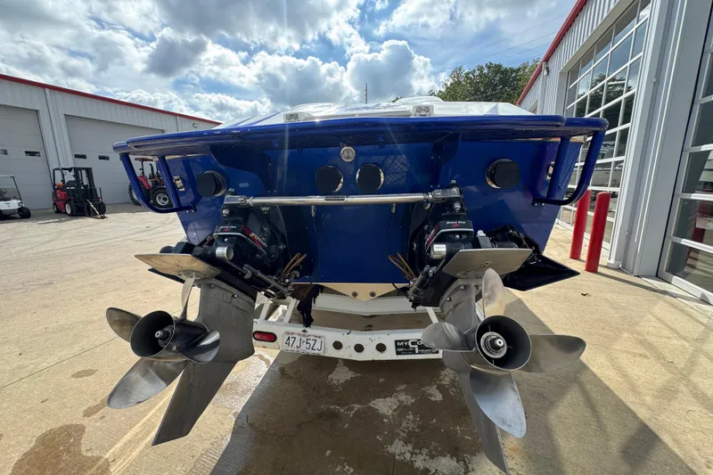 Slide: The Image of Rear view of a 2004 Cigarette 42 Tiger boat with dual propellers. - 4