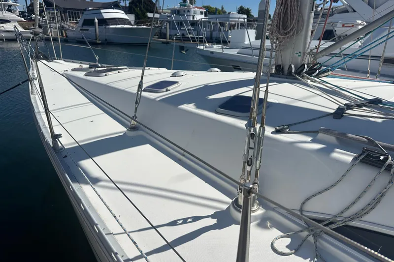 Slide: The Image of Jeanneau Sun Odyssey 45.2 sailboat deck, 2002 model, docked at marina. - 17