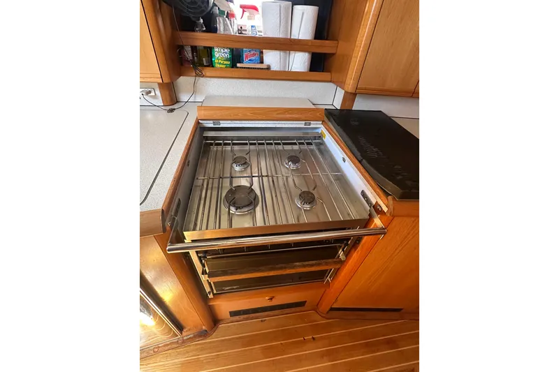 Slide: The Image of Jeanneau Sun Odyssey 45.2 yacht kitchen with stove, 2002 model. - 36