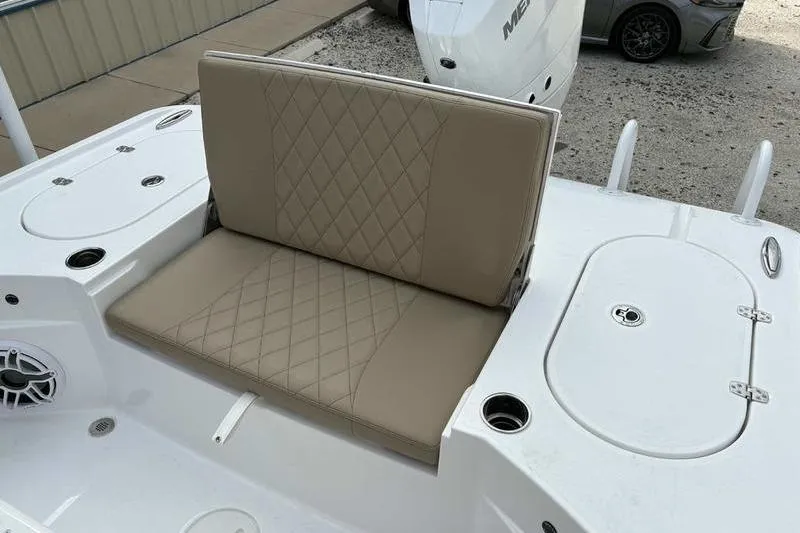 Slide: The Image of 2026 Blazer Bay 2700 Hybrid boat seat with beige diamond-stitched upholstery. - 6