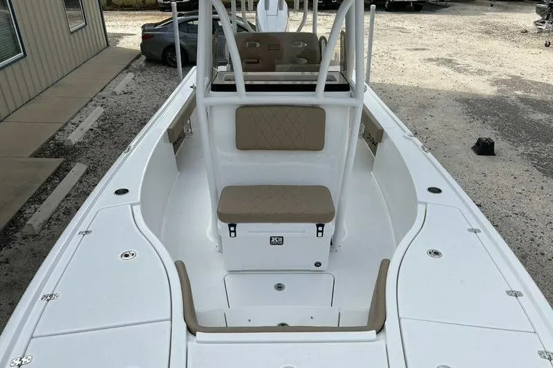 Slide: The Image of 2026 Blazer Bay 2700 Hybrid boat interior with seating and storage compartments. - 9