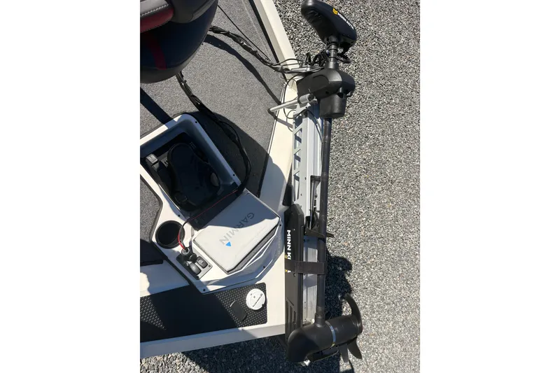 Slide: The Image of 2022 Boomeranger 198P boat deck with Minn Kota trolling motor and Garmin equipment. - 13