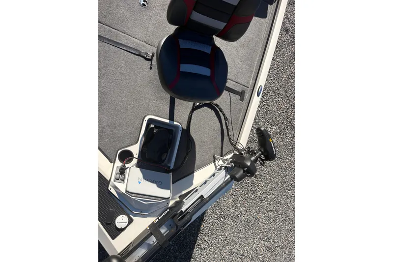 Slide: The Image of 2022 Boomeranger 198P boat interior with seat, Garmin device, and Minn Kota trolling motor. - 14