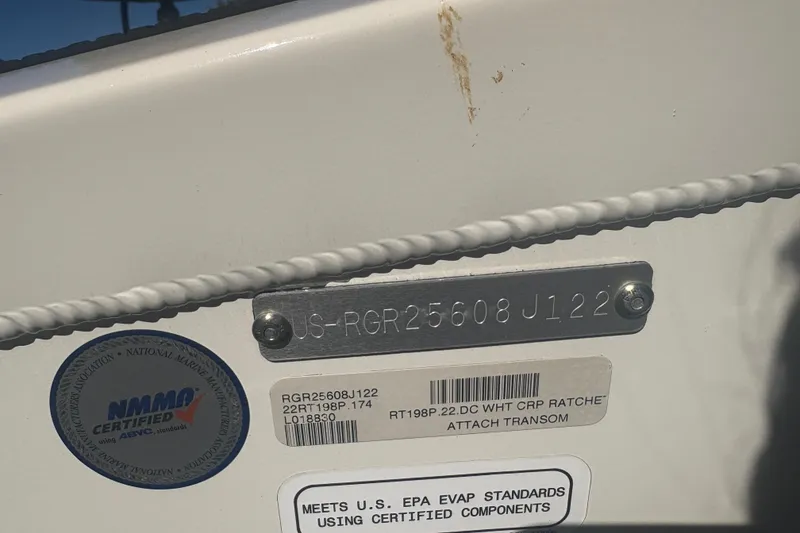 Slide: The Image of Boat identification plate on a 2022 Boomeranger 198P, showing certification and compliance labels. - 15