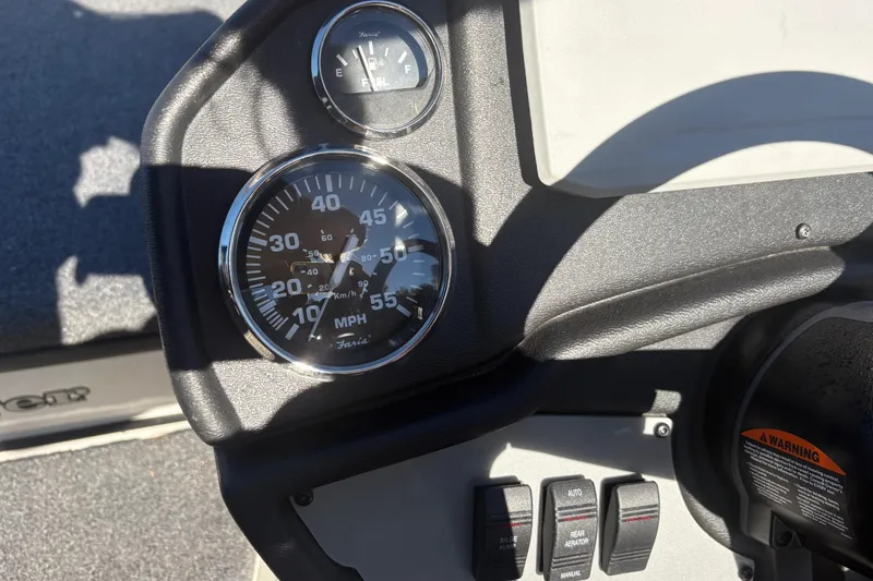 Slide: The Image of Dashboard of 2022 Boomeranger 198P with speedometer and fuel gauge. - 9