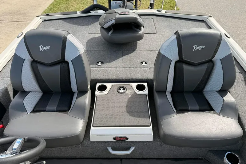 Slide: The Image of 2025 Ranger ALPHA 208 boat interior with dual gray seats and center console. - 3
