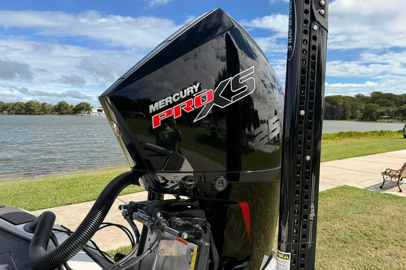 Slide: The Image of Mercury Pro XS engine on Ranger ALPHA 208, 2025 model, by a scenic lakeside. - 7
