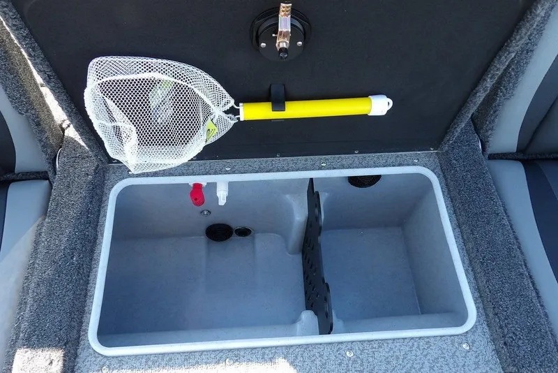 Slide: The Image of Livewell compartment in 2026 Lund 2075 Impact XS boat with fishing net. - 14