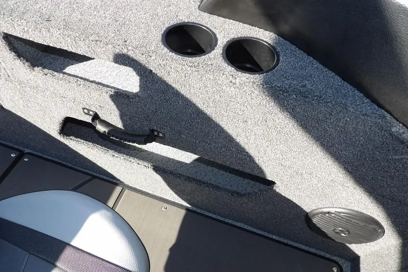 Slide: The Image of Interior of 2026 Lund 2075 Impact XS boat with cup holders and seating. - 33
